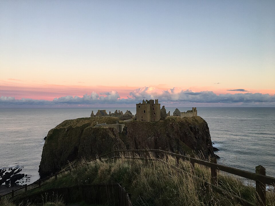 Dunnottar Castle on its coastal cliffs at dusk